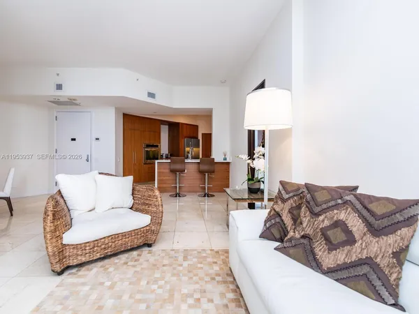 a kitchen with a sink and a microwave