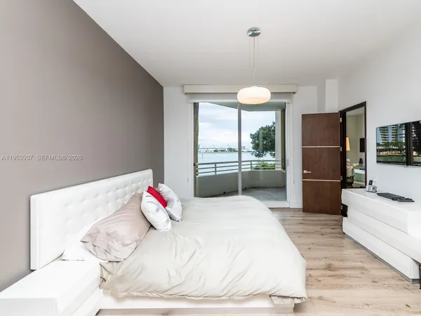 a bathroom with a tub and shower