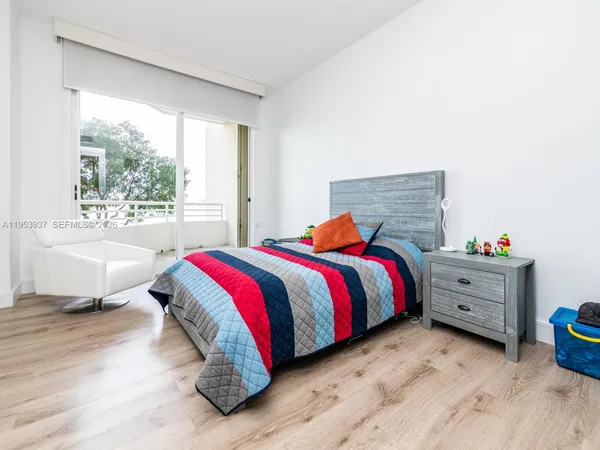 a view of a bathroom with mirror