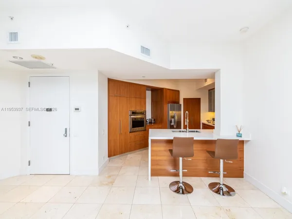 a view of a room with table and chair
