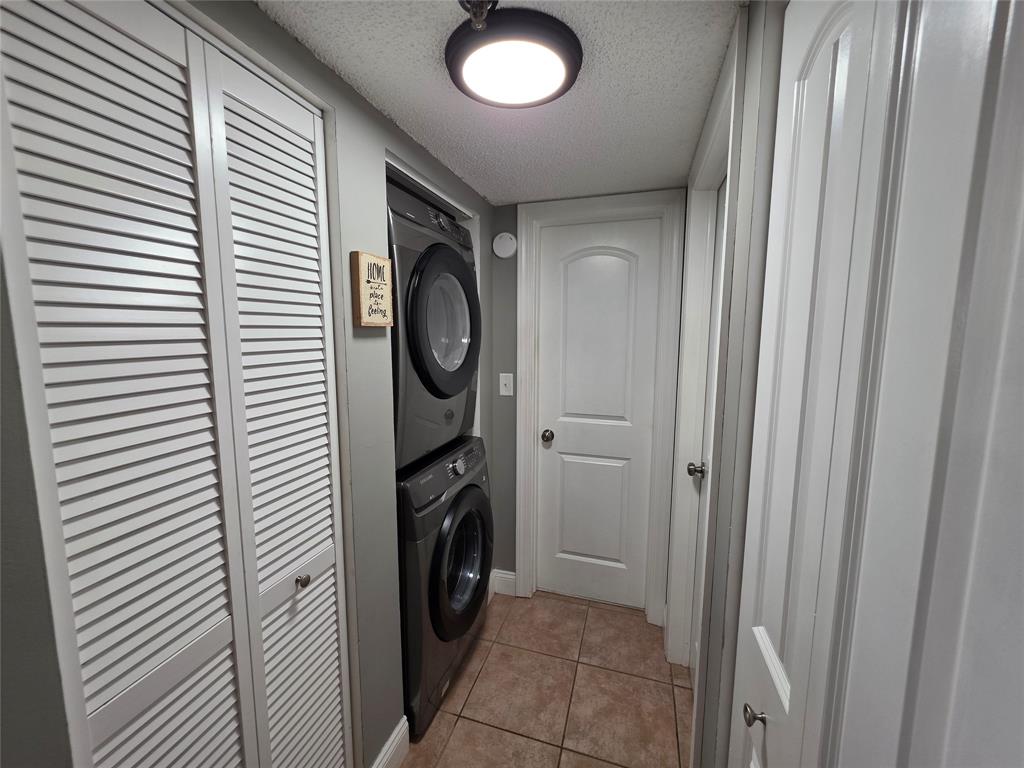 3940 Inverrary Boulevard, Unit 507A Fort Lauderdale, FL 33319 - Photo 11 of 35 a utility room with dryer and washer