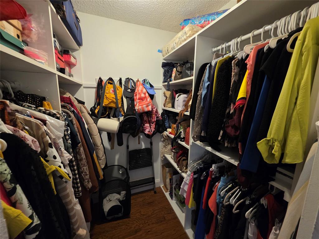 3940 Inverrary Boulevard, Unit 507A Fort Lauderdale, FL 33319 - Photo 22 of 35 a view of walk in closet with clothes and shoes