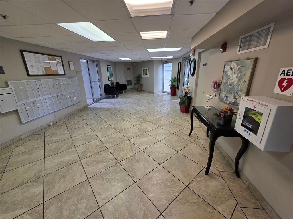 3940 Inverrary Boulevard, Unit 507A Fort Lauderdale, FL 33319 - Photo 28 of 35 a living room with furniture