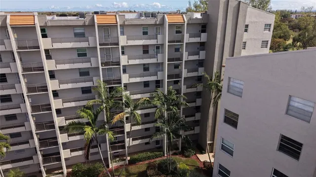 an aerial view of residential house with outdoor space