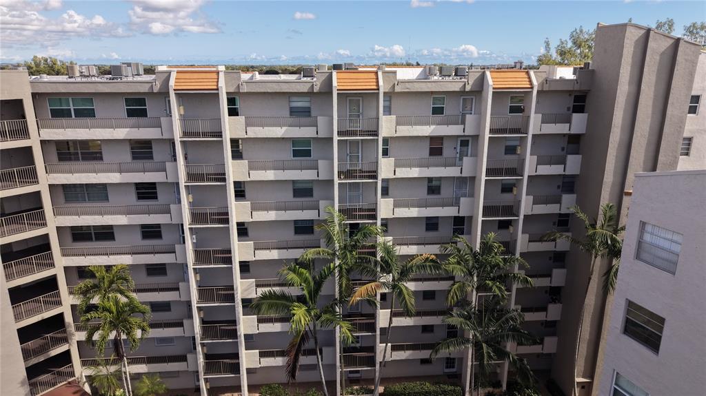 3940 Inverrary Boulevard, Unit 507A Fort Lauderdale, FL 33319 - Photo 34 of 35 a view of a tall building in the backyard