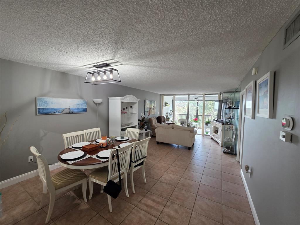 3940 Inverrary Boulevard, Unit 507A Fort Lauderdale, FL 33319 - Photo 7 of 35 a view of a livingroom and dining room