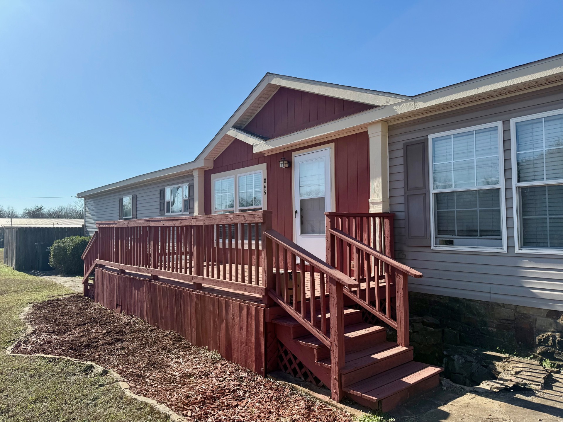 845 Caldwell Street Lexington, TX 78947 - Photo 34 of 39 Entrance to property featuring a wooden deck