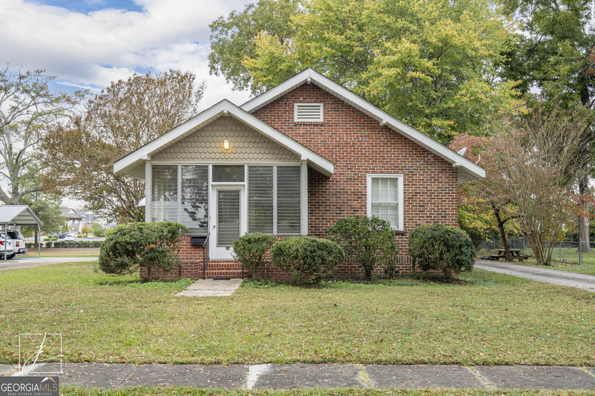 24 Ash Street Northeast Rome, GA 30161 - Photo 1 of 1 a front view of a house with garden