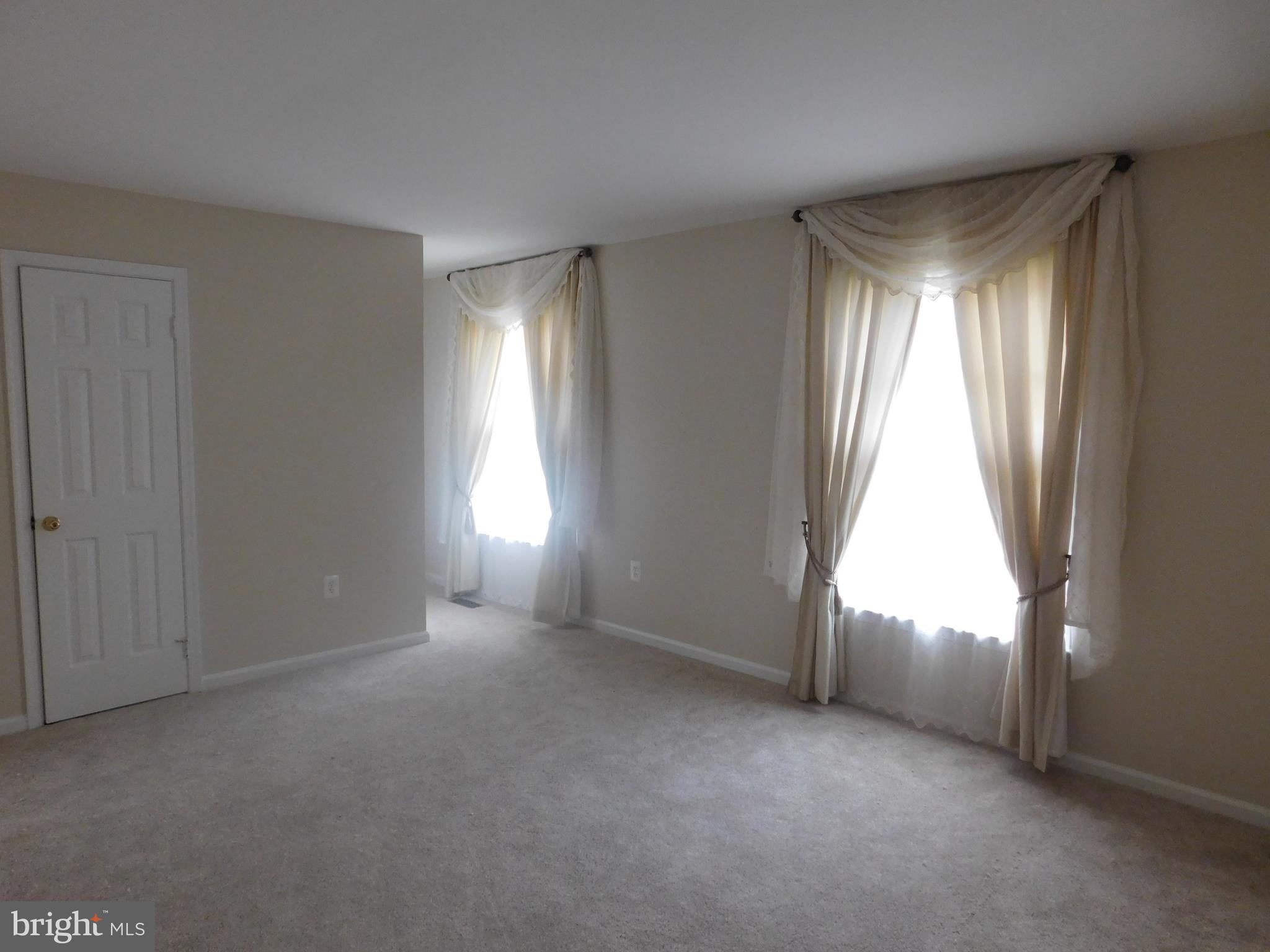 9239 Rockefeller Lane Springfield, VA 22153 - Photo 10 of 20 a view of empty room and window