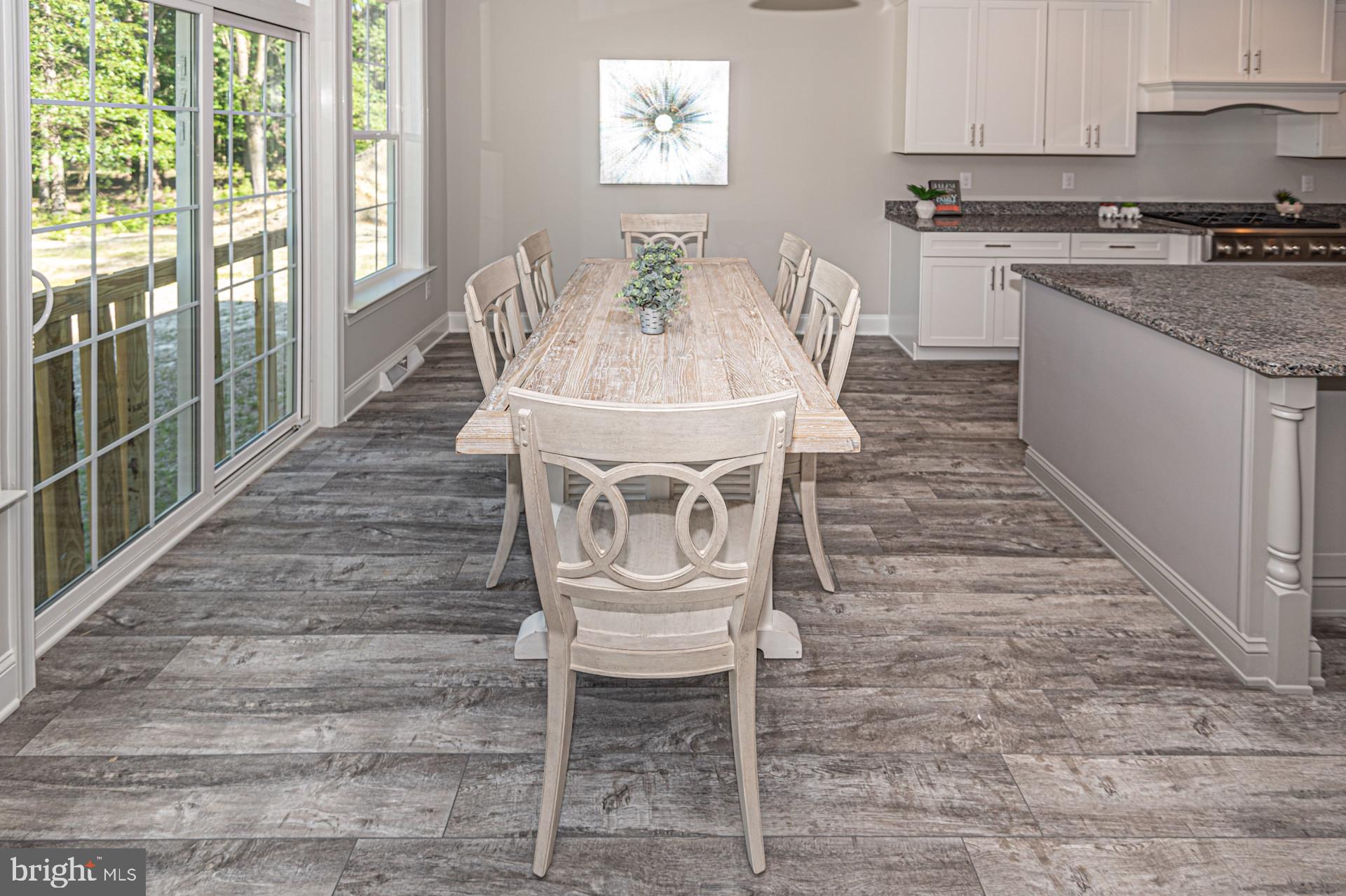 2 Mt Joy Road Millsboro, DE 19966 - Photo 12 of 14 a view of a dining room with furniture window and outside view