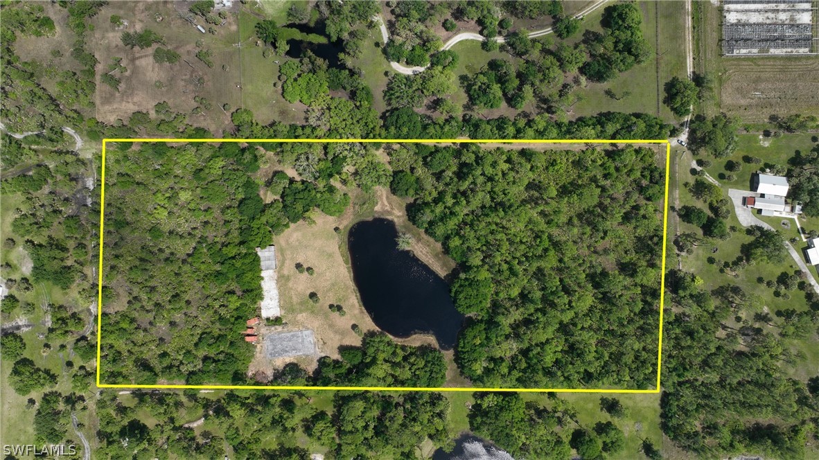 1514 Deer Run LaBelle, FL 33935 - Photo 2 of 18 an aerial view of a garden