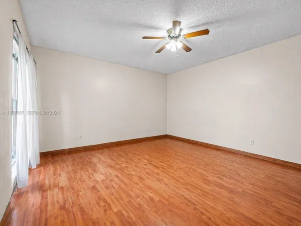 a view of a bathroom from a hallway