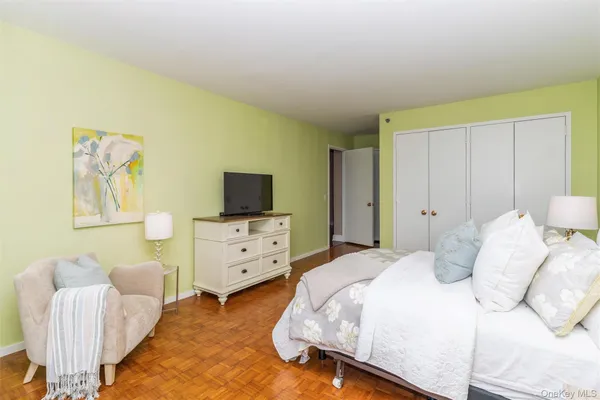 a bedroom with a bed and furniture