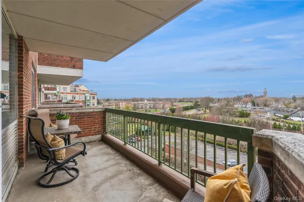 a view of roof deck with furniture