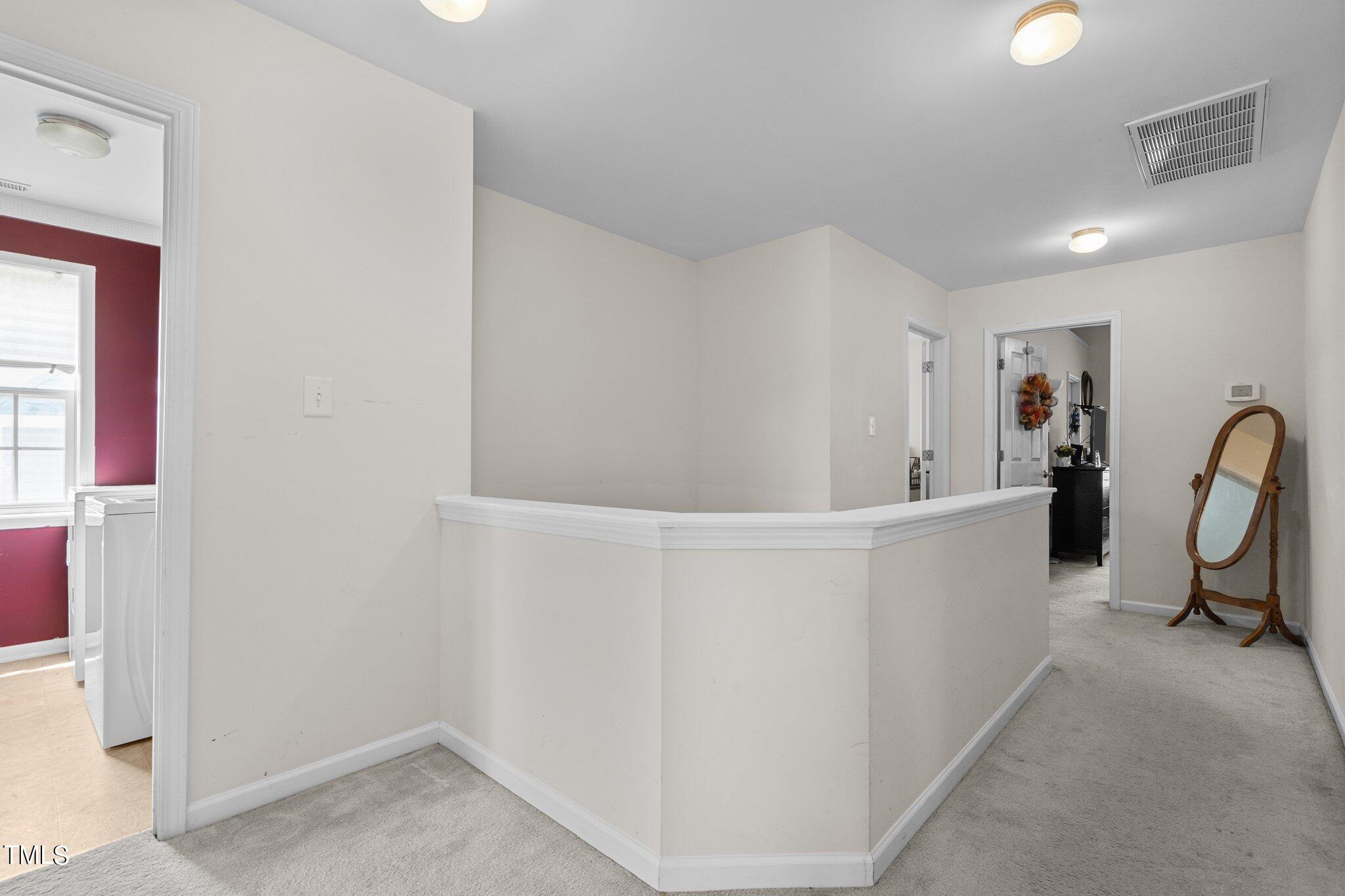 3930 Evans Drive Raleigh, NC 27610 - Photo 16 of 44 a view of a room with furniture and window