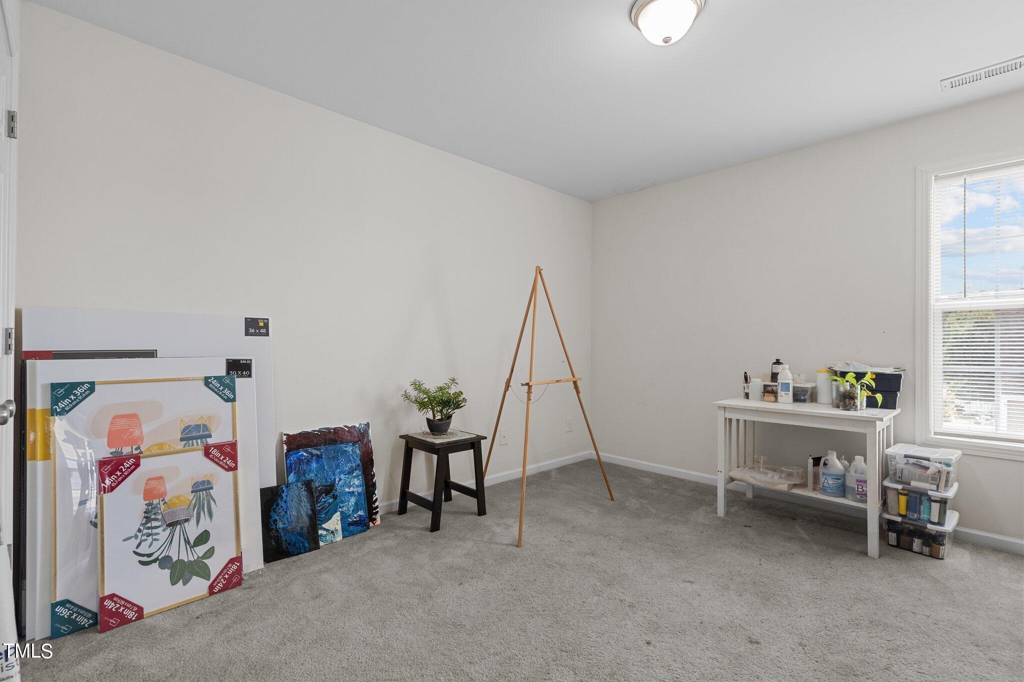 3930 Evans Drive Raleigh, NC 27610 - Photo 26 of 44 a view of a room with baby toys
