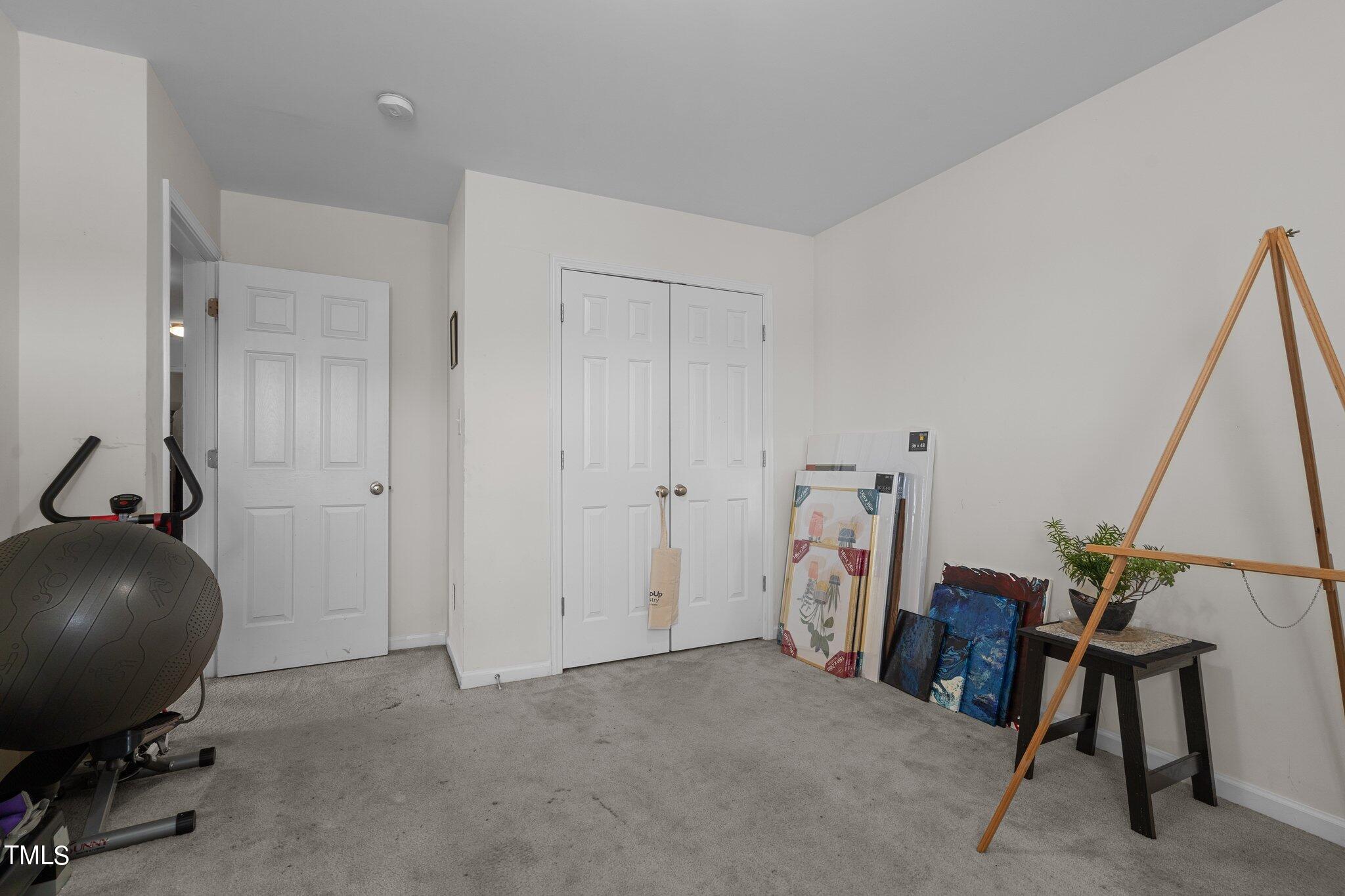 3930 Evans Drive Raleigh, NC 27610 - Photo 27 of 44 a view of a room with gym equipment