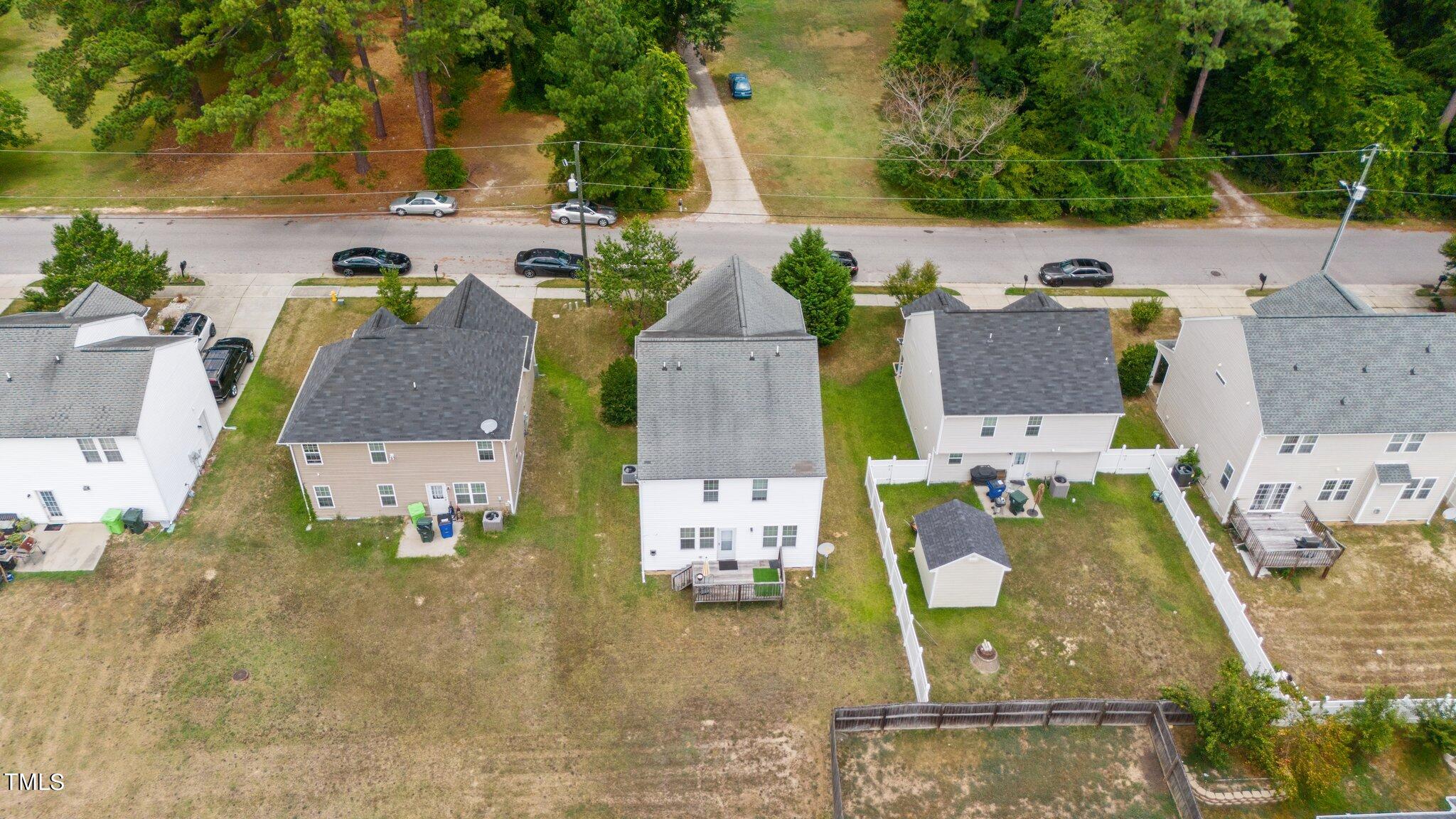 3930 Evans Drive Raleigh, NC 27610 - Photo 40 of 44 an aerial view of residential houses with outdoor space