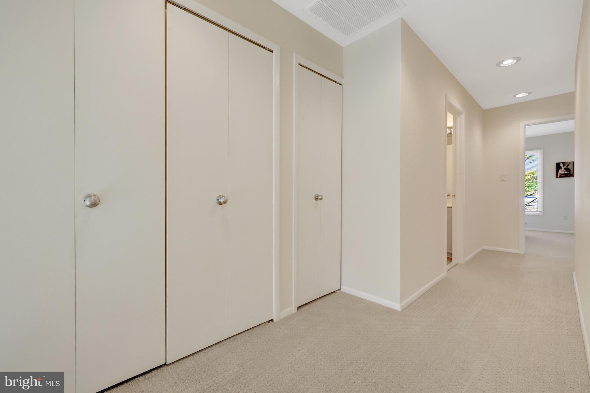 1926 Lakeport Way Reston, VA 20191 - Photo 29 of 54 Upper hallway features a linen closet & laundry.