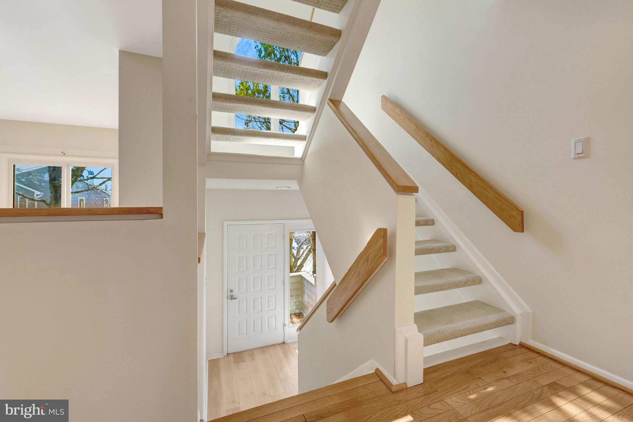 1926 Lakeport Way Reston, VA 20191 - Photo 5 of 54 Great natural light in the foyer and stairwell.