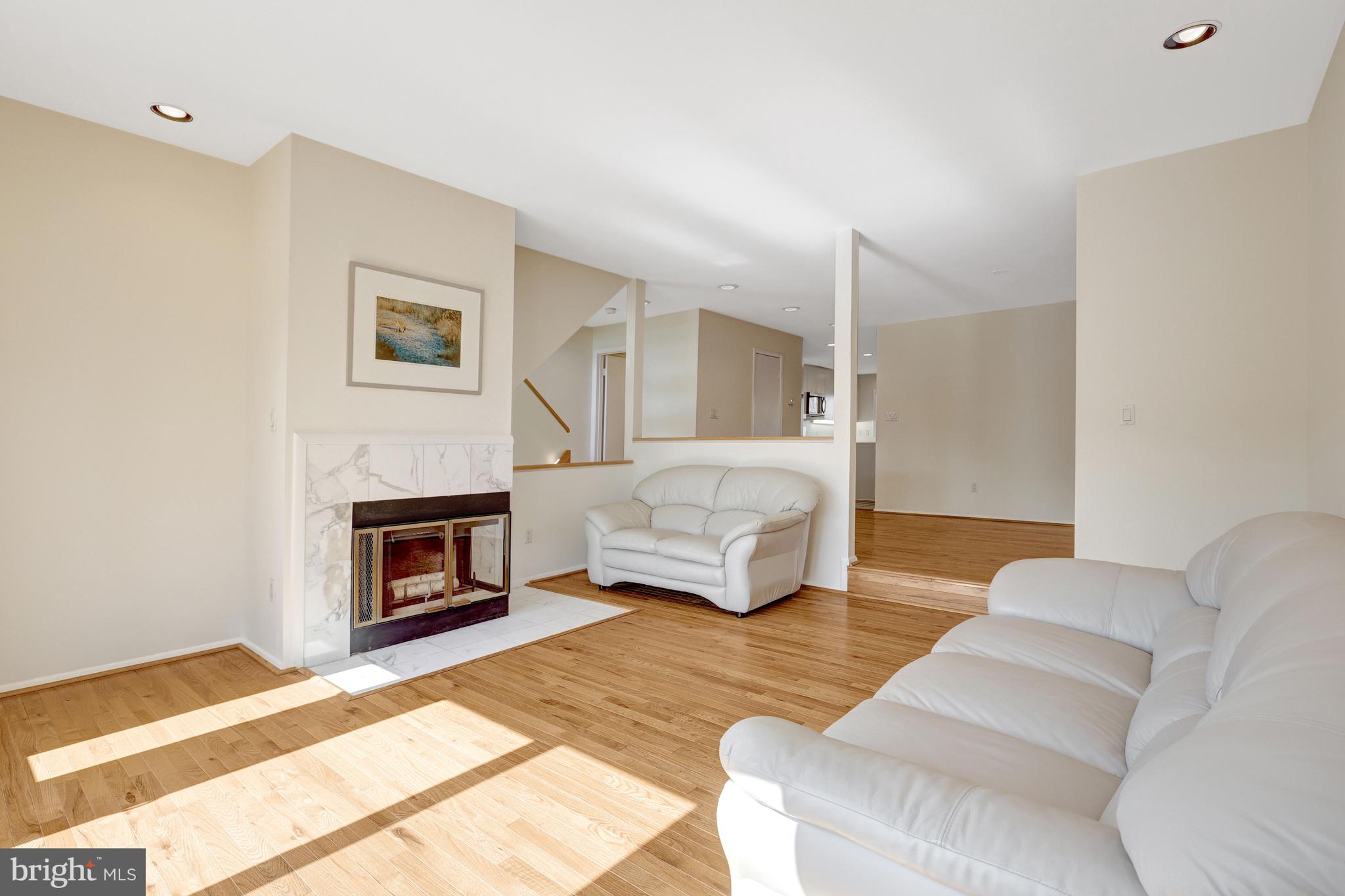 1926 Lakeport Way Reston, VA 20191 - Photo 7 of 54 Living room opens to the dining room.