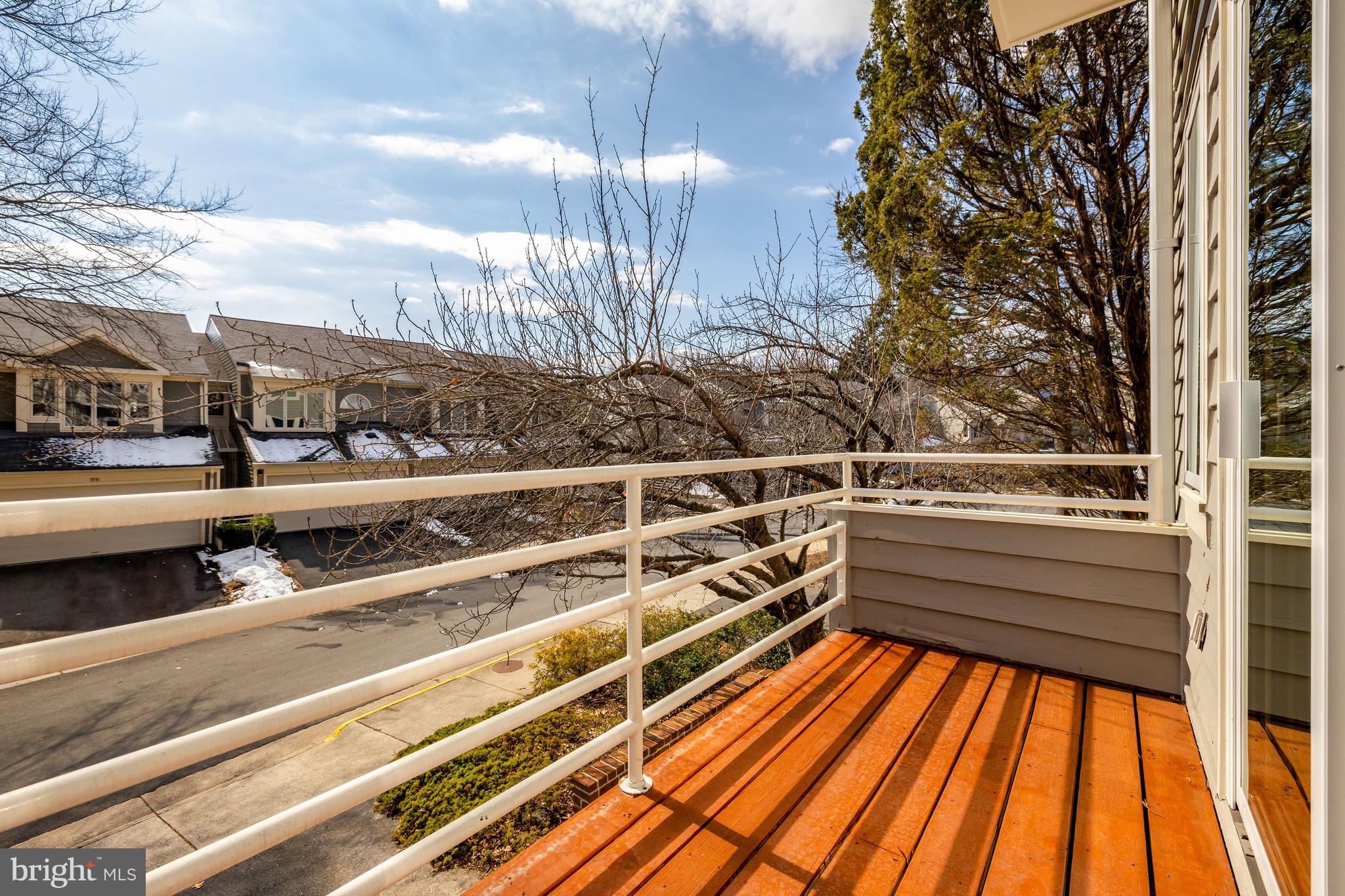 1926 Lakeport Way Reston, VA 20191 - Photo 9 of 54 The living room leads to a front balcony.