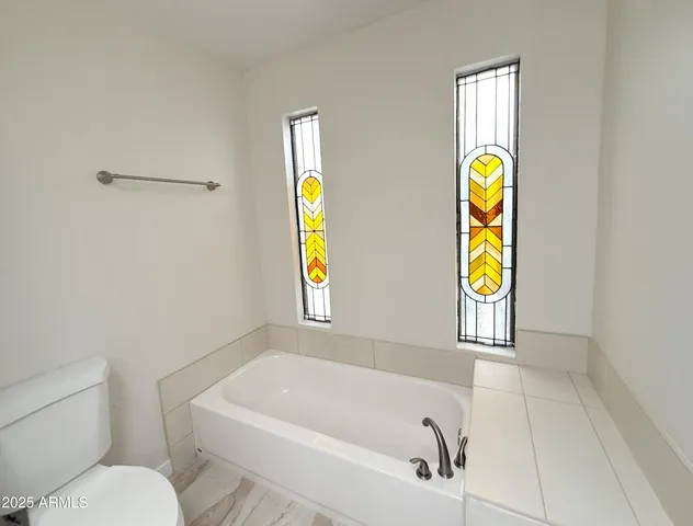 a bathroom with a sink and bathtub