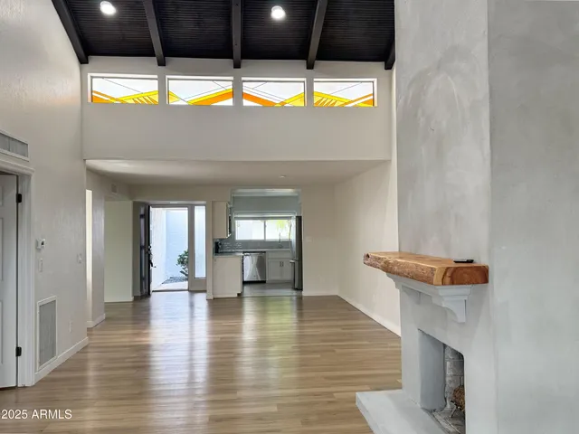 a view of an empty room and window