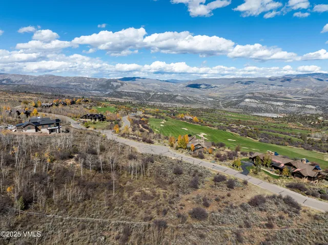 a view of a city with an ocean