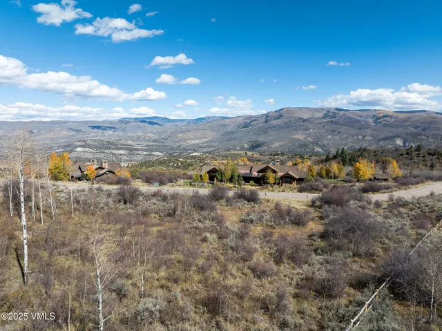 a view of a houses with beach