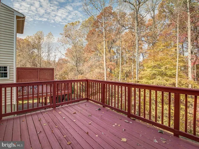 a view of wooden balcony with wooden floor