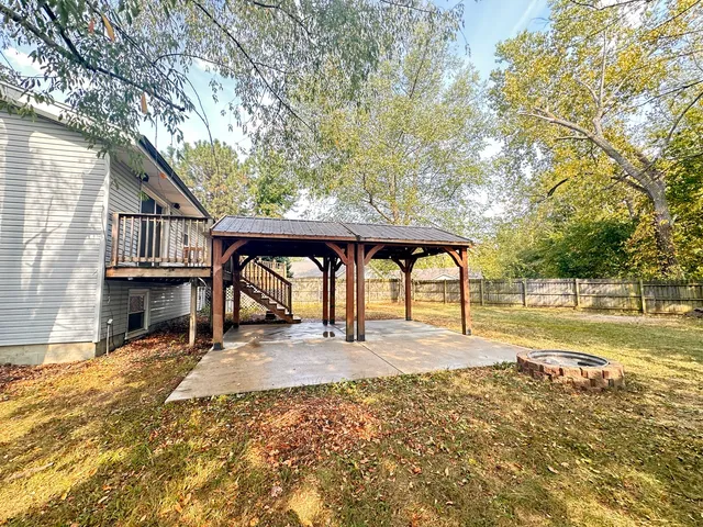 a view of a yard with a slide
