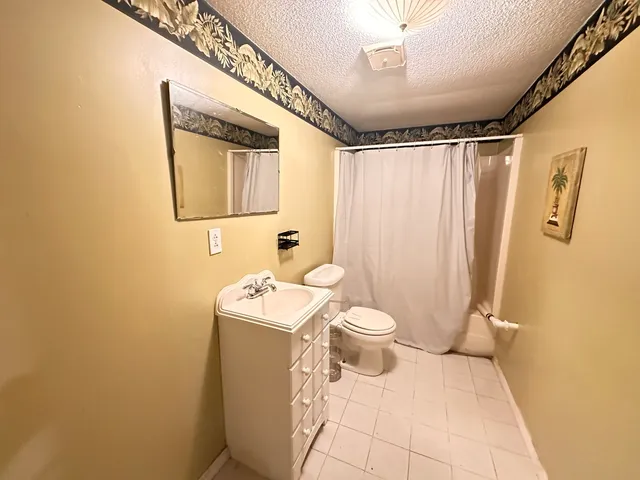 a view of a room with a hallway