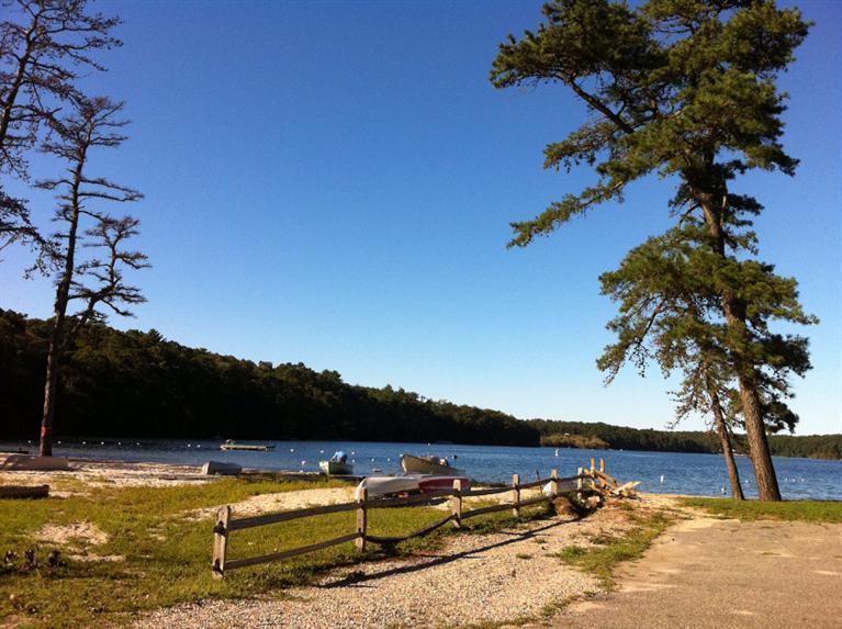 13 E Road Mashpee, MA 02649 - Photo 3 of 18 a view of a lake with houses
