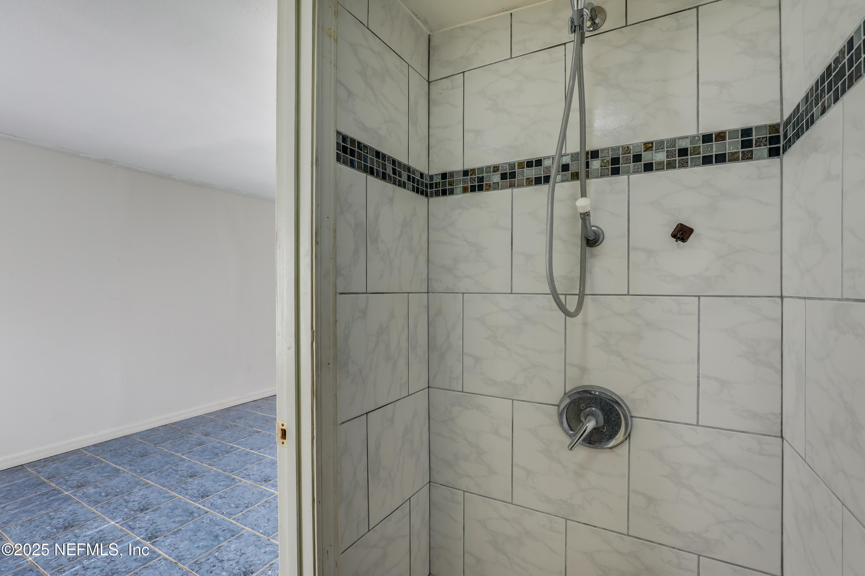 10524 Rutgers Road Jacksonville, FL 32218 - Photo 24 of 46 a bathroom with a shower