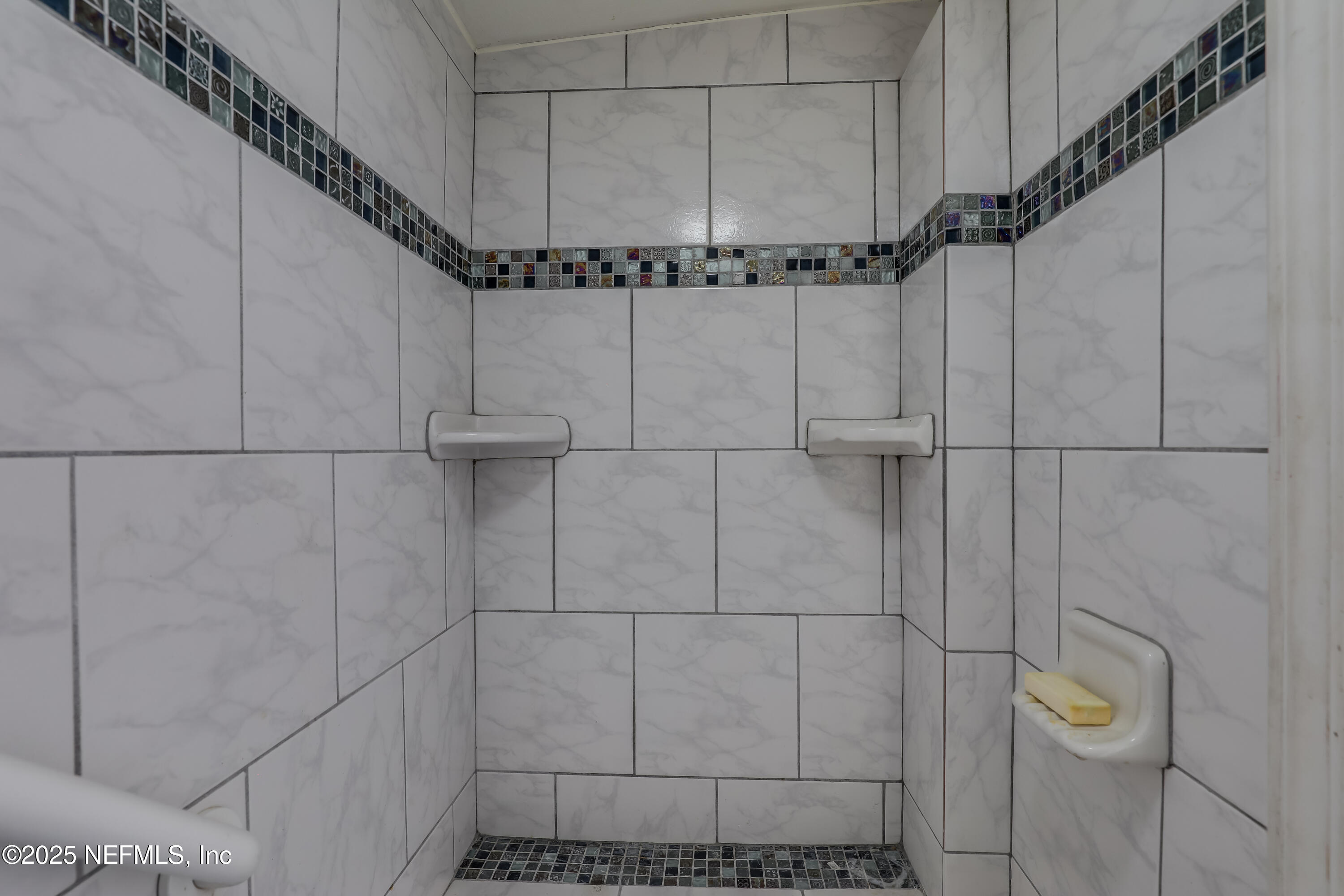 10524 Rutgers Road Jacksonville, FL 32218 - Photo 25 of 46 a bathroom with a shower