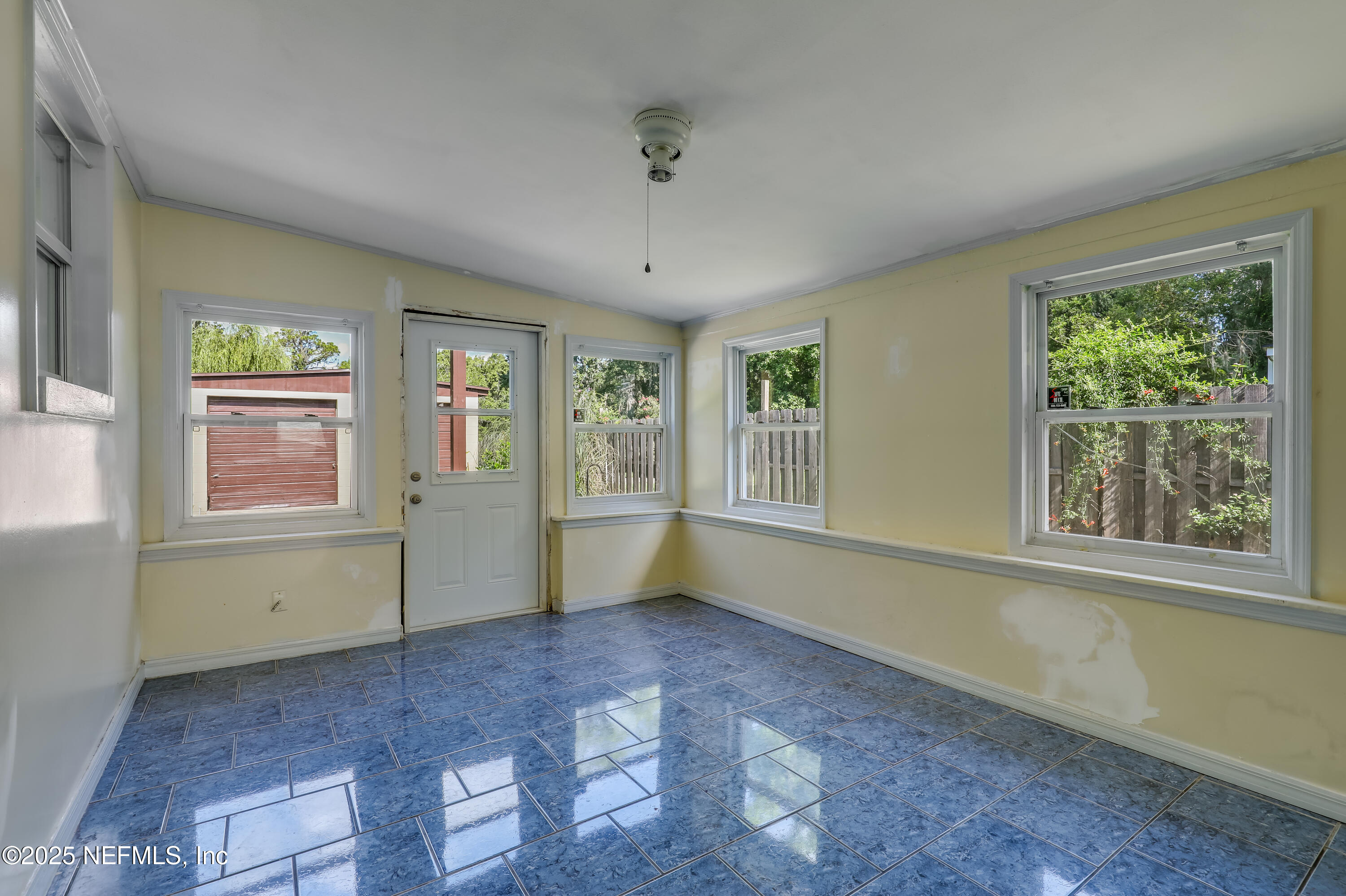 10524 Rutgers Road Jacksonville, FL 32218 - Photo 27 of 46 a view of an empty room with a window