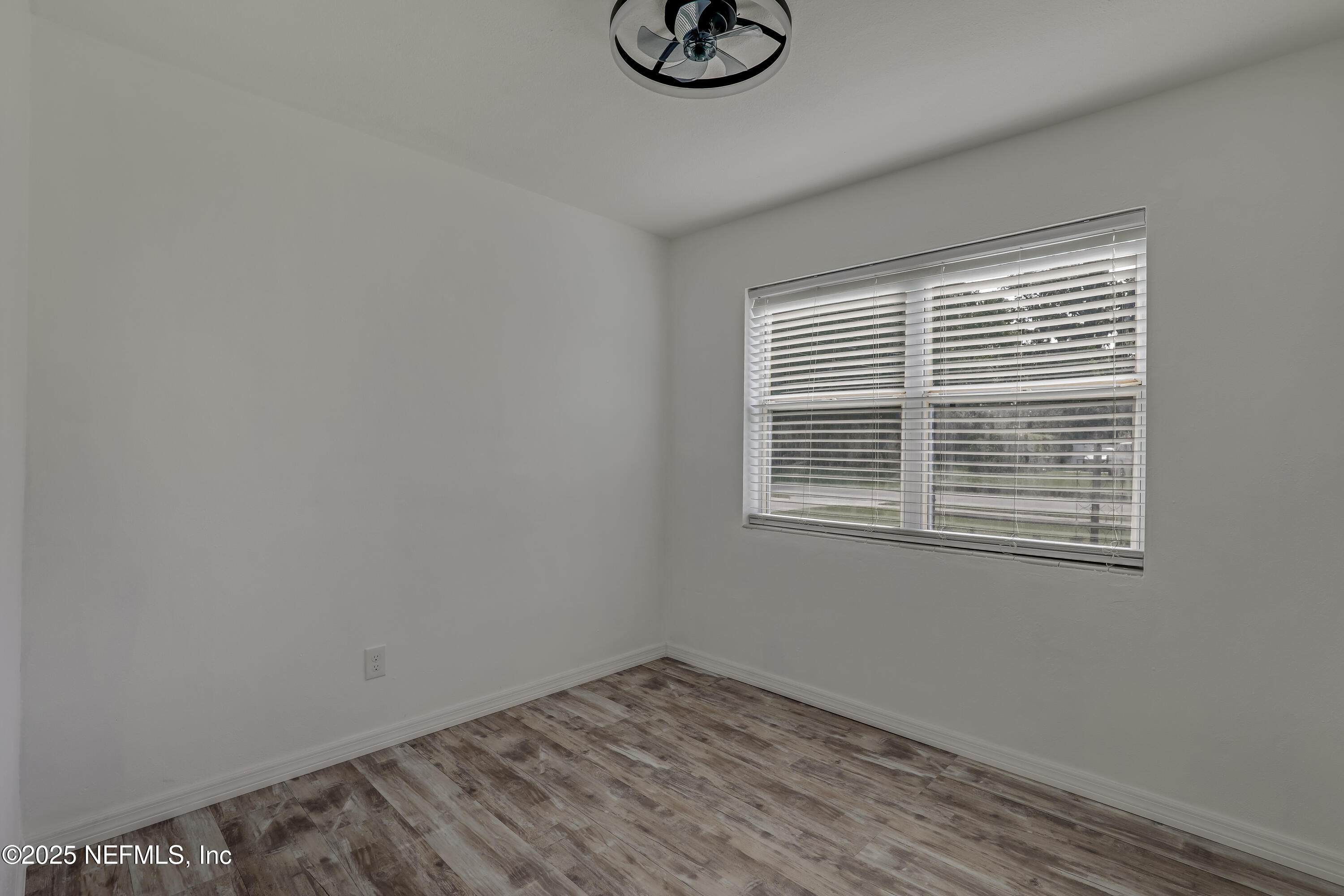 10524 Rutgers Road Jacksonville, FL 32218 - Photo 29 of 46 a view of wooden floor and window in a room