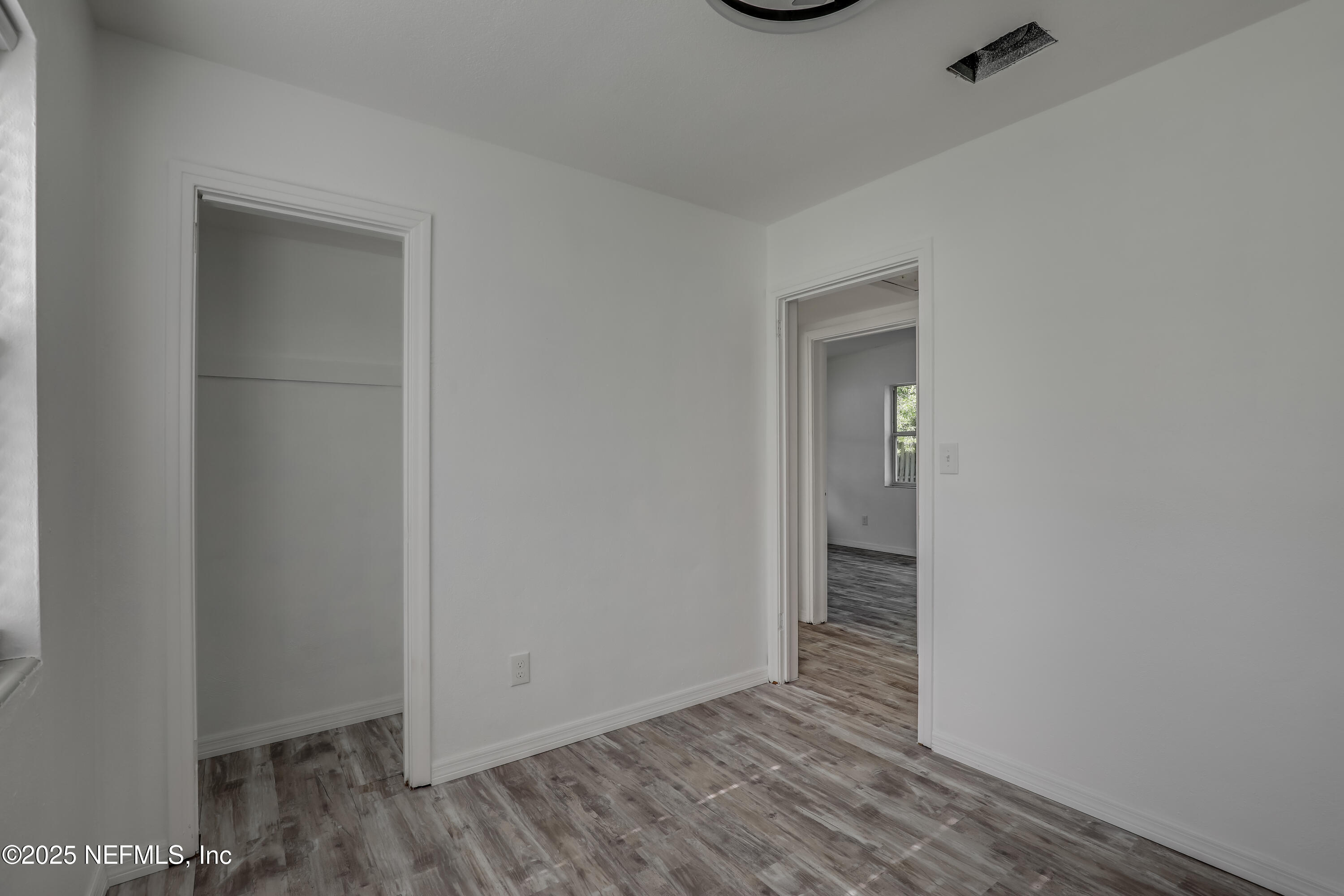 10524 Rutgers Road Jacksonville, FL 32218 - Photo 30 of 46 a view of a room with wooden floor