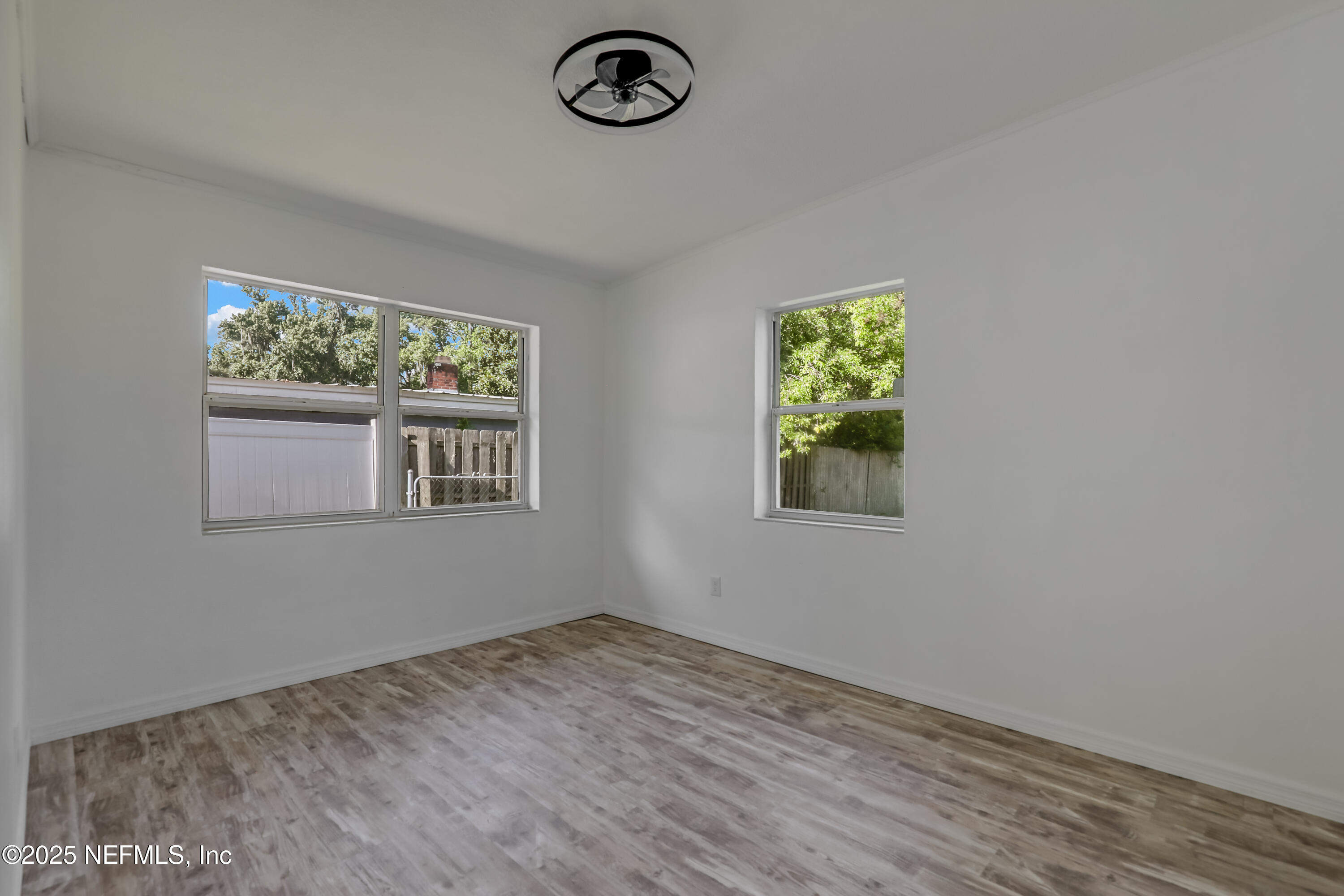 10524 Rutgers Road Jacksonville, FL 32218 - Photo 31 of 46 an empty room with a window