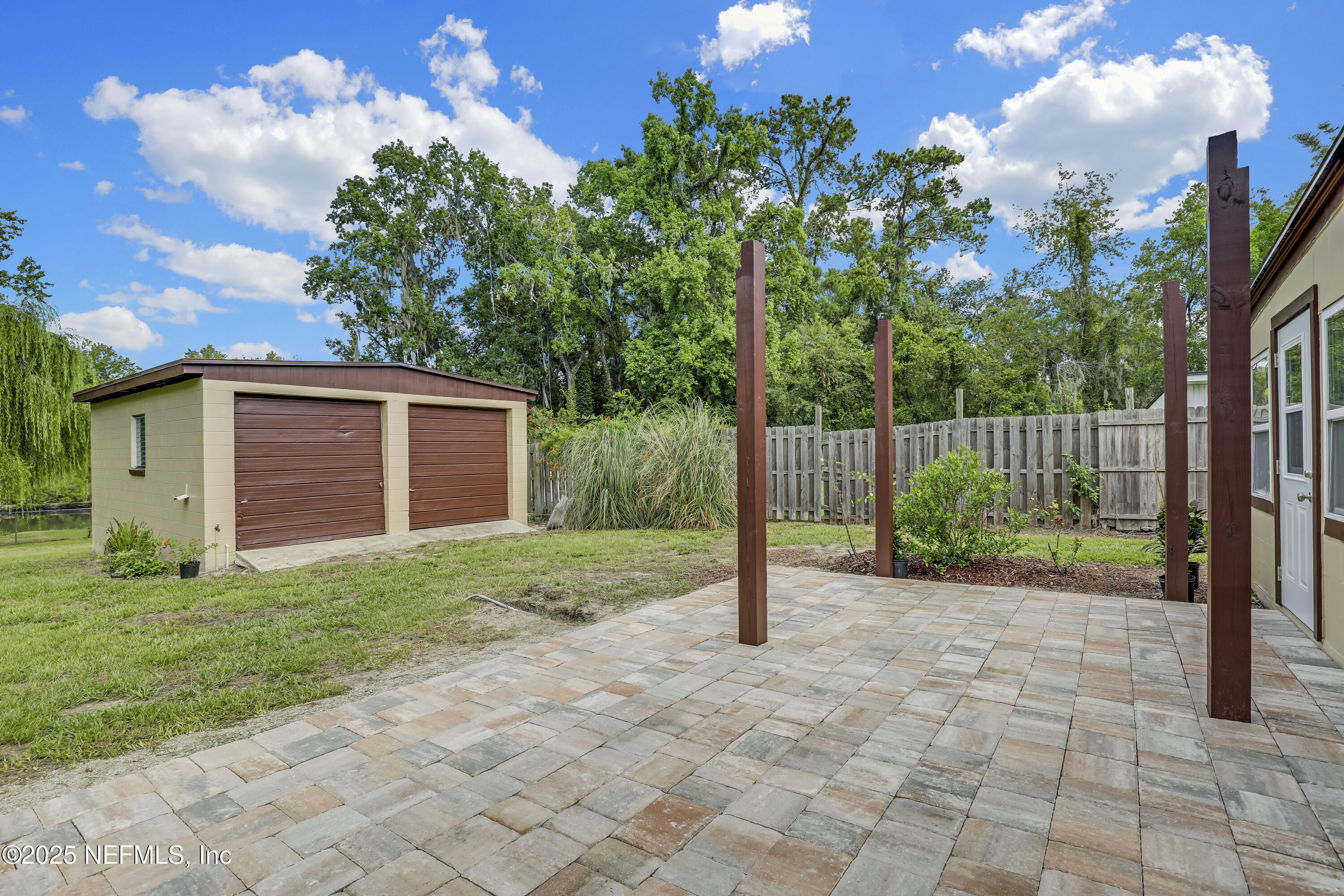 10524 Rutgers Road Jacksonville, FL 32218 - Photo 35 of 46 a view of a house with a backyard