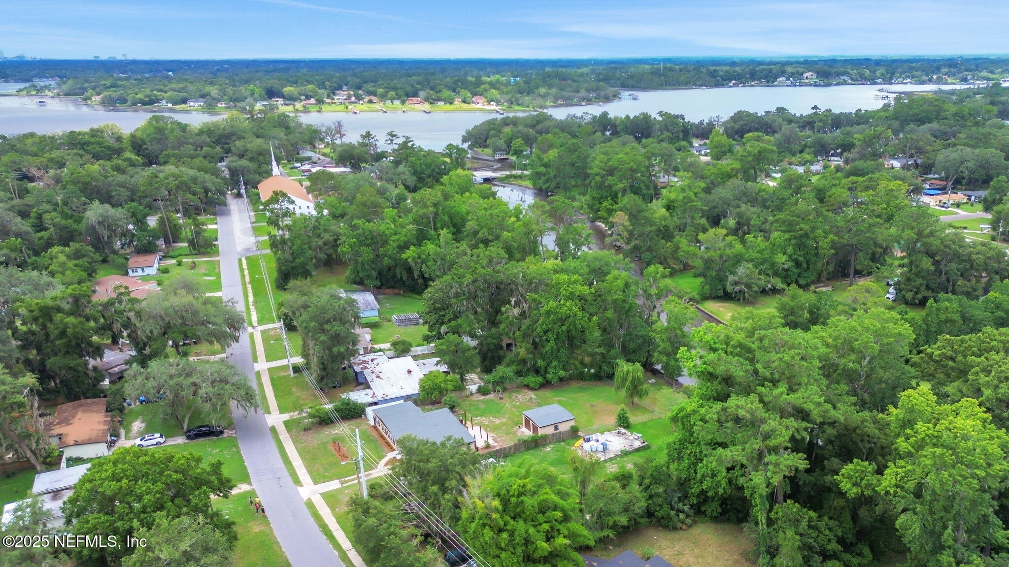 10524 Rutgers Road Jacksonville, FL 32218 - Photo 45 of 46 an aerial view of a city with lots of residential buildings and mountain view
