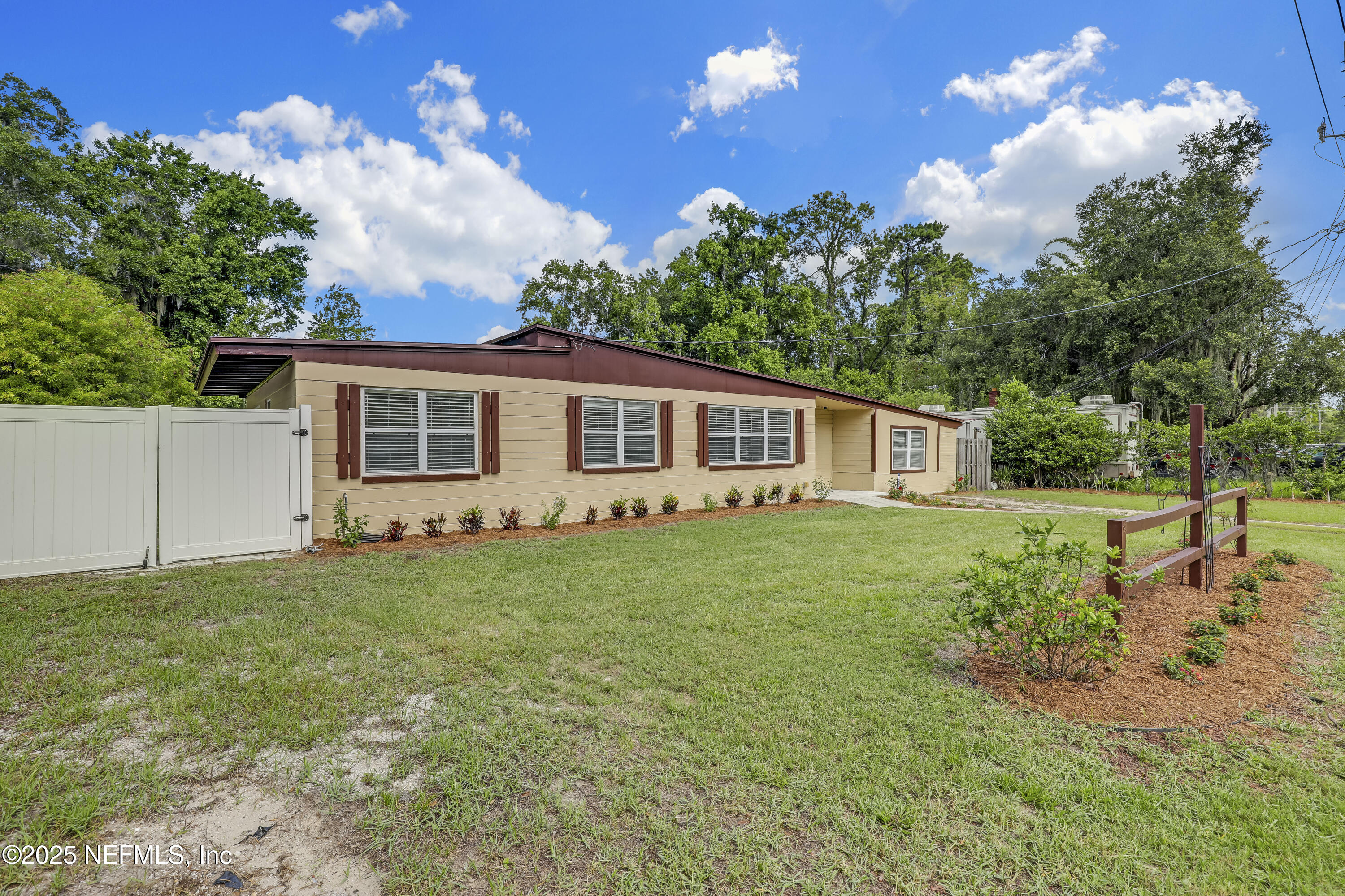 10524 Rutgers Road Jacksonville, FL 32218 - Photo 46 of 46 a view of a house with backyard and garden