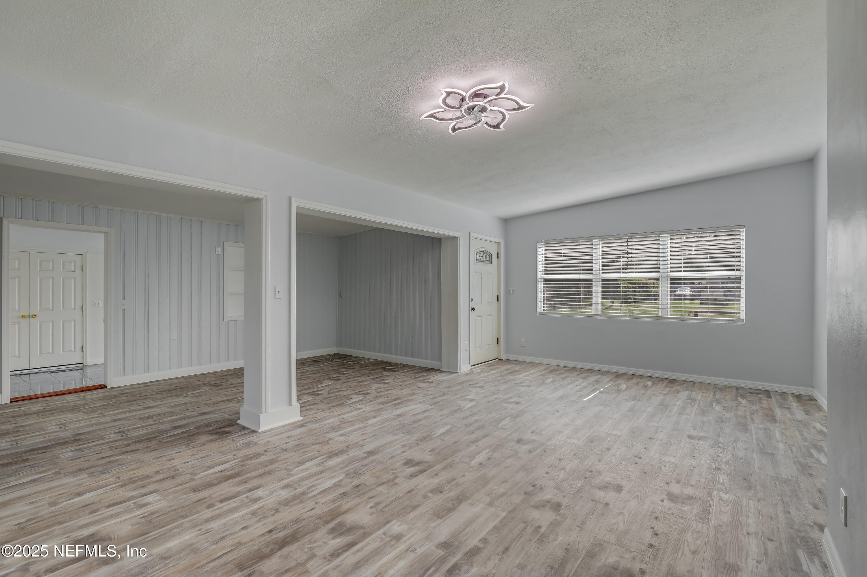 10524 Rutgers Road Jacksonville, FL 32218 - Photo 5 of 46 a view of an empty room with a window