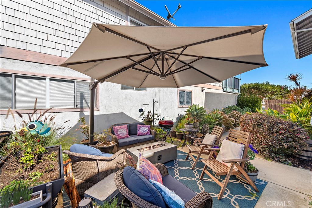 34081 Colegio Drive Dana Point, CA 92629 - Photo 17 of 34 a patio with a patio table and chairs
