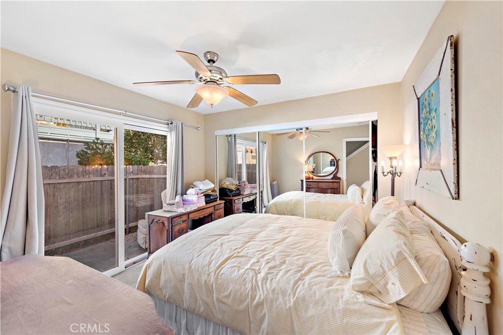 34081 Colegio Drive Dana Point, CA 92629 - Photo 9 of 34 a bedroom with a large bed and a chandelier