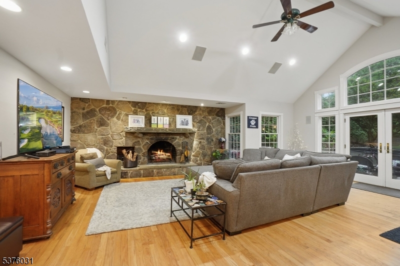 21 Spring Street Chatham, NJ 07928 - Photo 23 of 48 a living room with furniture and a fireplace