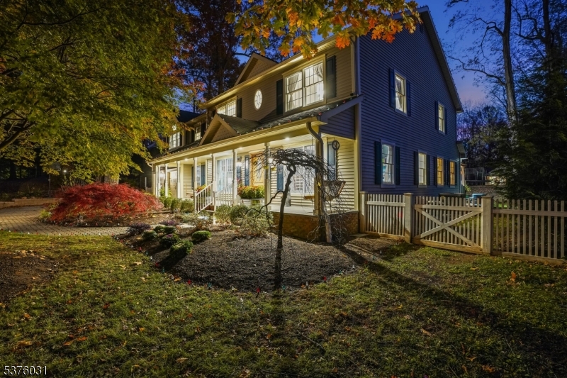 21 Spring Street Chatham, NJ 07928 - Photo 47 of 48 a view of a house with a yard