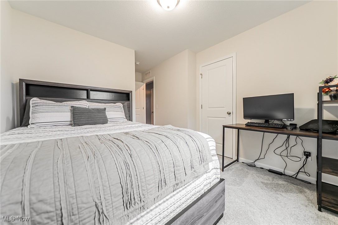 6105 Dunham Road Maple Heights, OH 44137 - Photo 17 of 38 Carpeted bedroom featuring baseboards