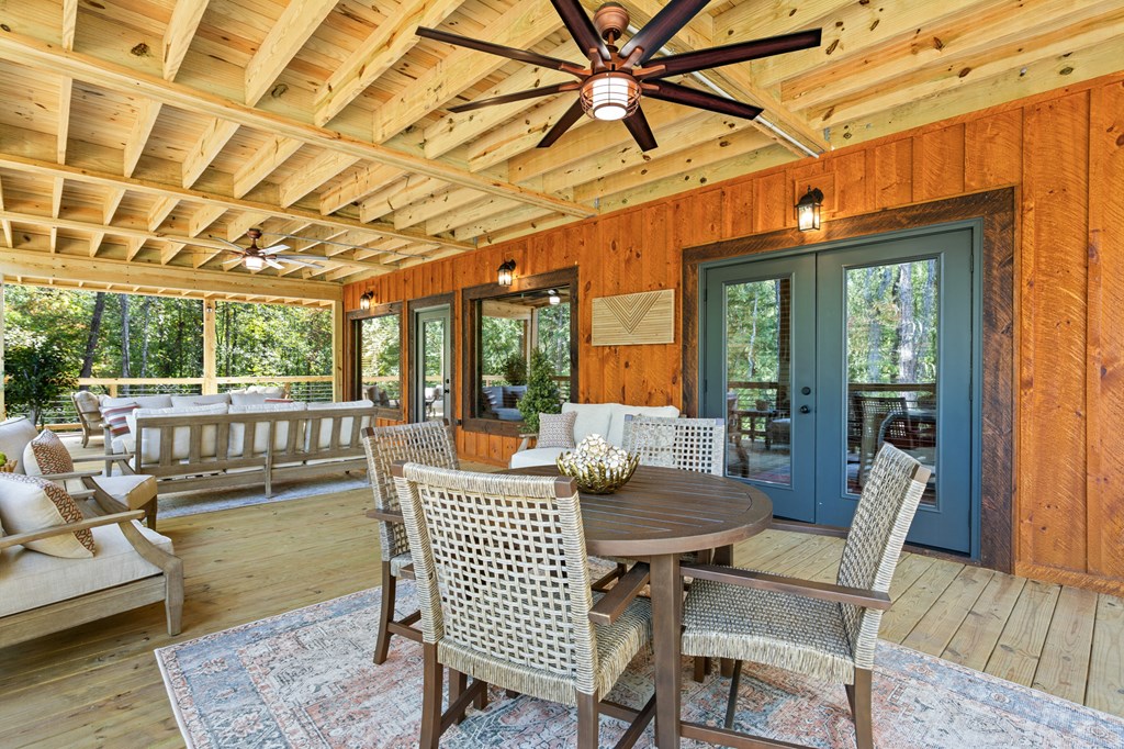 245 East Shalom Court Blue Ridge, GA 30513 - Photo 49 of 78 a outdoor space with patio the couches and chairs with wooden floor